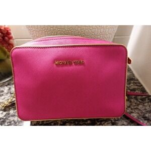 Michael Kors Fushia Pink Crossbody purse with gold accents Jet Set Large bag